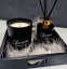 Detail zlatého hrdla a bílé etikety luxusního aroma difuzéru Dark Essence